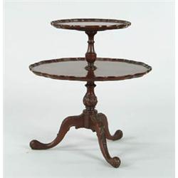 Lot #  951:  TWO TIER MAHOGANY CARVED STAND.