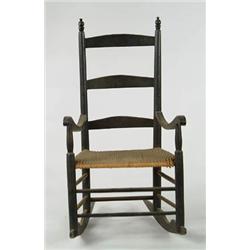 Lot #  1043:  BLACK LADDERBACK ROCKER.