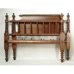 Lot #  1064:  ANTIQUE SPOOL HEADBOARD AND FOOT BOARD.