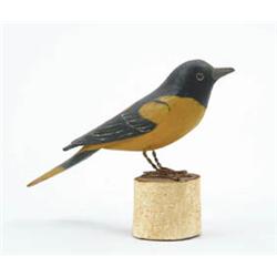 Lot #  1075:  CARVED AND PAINTED BALTIMORE ORIOLE.