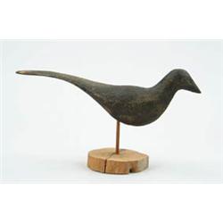 Lot #  1078:  FOLK ART CARVED AND PAINTED BLACK BIRD.