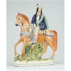 Lot #  1128:  STAFFORDSHIRE FIGURE OF MAN ON HORSE.