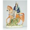 Image 1 : Lot #  1128:  STAFFORDSHIRE FIGURE OF MAN ON HORSE.