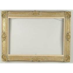 Lot #  1140:  CARVED WOOD AND GESSO DECORATED FRAME.