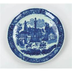 Lot #  1143:  DECORATED BLUE AND WHITE IRONSTONE CHARGER.