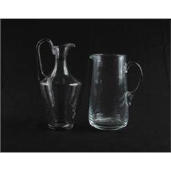 Lot #  1147:  TWO BLOWN GLASS PITCHERS.