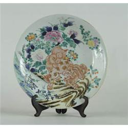 Lot #  1148:  ORIENTAL ENAMELED PLATE WITH FOO DOG AND FLOWERS.