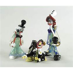 Lot #  1153:  THREE ITALIAN COLORED GLASS CLOWNS.
