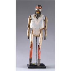 Lot #  1154:  20TH CENTURY CARVING OF BEARDED MAN WITH PINNED ARMS AND LEGS WHICH ARTICULATE.