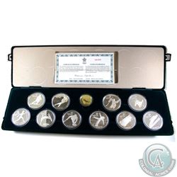 Complete 1988 Calgary Olympic Sterling Silver 10-Coin Set with 14K $100 Gold Coin in the Original Di