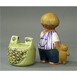 A candlestick and a figurine