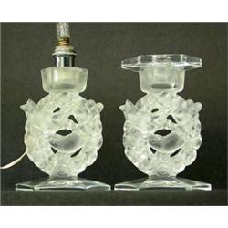 A candlestick and a table lamp