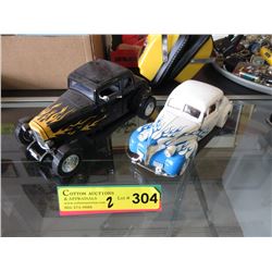 Two 1:24 Scale Model Cars