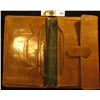 Image 2 : Old leather wallet with newspaper clippings and some old Good For Tokens from Elgin, Iowa.