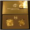 Image 1 : 1991 Two-Coin Uncirculated Set of Mount Rushmore Anniversary Coins in original box with literature.