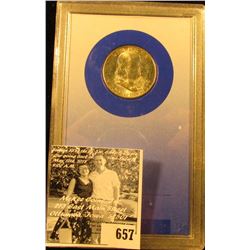 1948 D Franklin Half Dollar in an "ICI" holder, Brilliant Uncirculated.