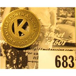 "1927/Knoxville Power & Light Co.", "Good For/One Fair", (Iowa Transportation Token).