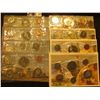 Image 1 : 1974, 1975, 1976, 1977, 1978, 1979. 1981, & 1986 Canada Six-Piece Uncirculated Coin Sets in original