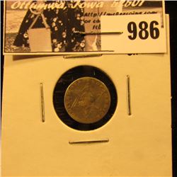 986 . 1858 U.S. Three-Cent Silver, VF, but bent.
