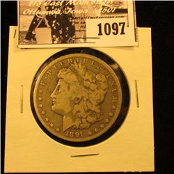 1097 . 1891 CC U.S. Morgan Silver Dollar, Fine.