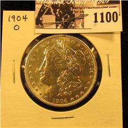 1100 . 1904 O U.S. Morgan Silver Dollar, Brilliant Uncirculated.
