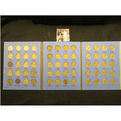 1400 . 1938 up Nearly complete Set of Jefferson Nickels in a blue Whitman folder. The 1950 D is BU.
