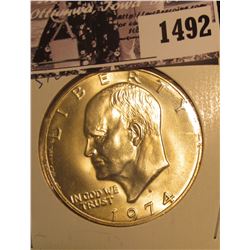 1492 . 1974 S Silver Gem BU Eisenhower Dollar, carded in 2 x 2 holder.