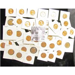 1761 . (45) various carded Lincoln Cents dating from 1955S to 1982. Most of which are BU and include