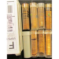 1769 . (6) partial rolls of BU Memorial Cents 1959-64; & a couple of plastic tubes containing AU-BU 