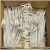 Image 1 : BOX OF OVER 70 WHITE PLASTIC CLOTHING HANGERS