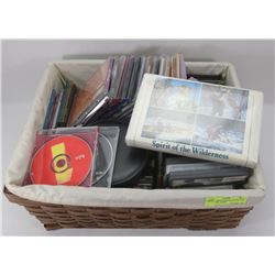 MISC BASKET WITH ASSORTED CDS, DVDS, VHS' - SOME