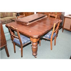 Antique English dining table with heavy bulbous legs and porcelain castors and two 17 1/2" insert le