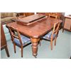 Image 1 : Antique English dining table with heavy bulbous legs and porcelain castors and two 17 1/2" insert le