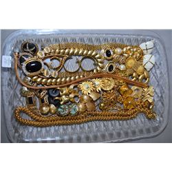 Tray lot of vintage gold toned collectible costume jewellery including necklaces, brooches, bracelet