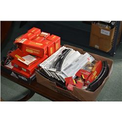 Two tray lots of mostly Triang Hornby retail product including track, controllers and switches