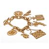 Image 4 : Chanel Vintage Gold 7 Icon Dangling Charm Bracelet