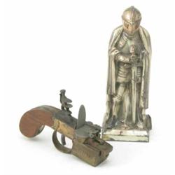 A Dunhill tinder pistol lighter, with makers stamp, 5.5ins and another lighter in the form of a k...