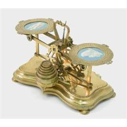 A Samson Mordan and Co. brass letter balance, with ceramic panel scales on pierced foliate suppor...