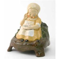 A novelty papier mache loudspeaker case modelled as Miss Muffett, manufactured by Andia, England,...