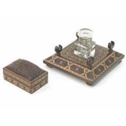 A cut glass inkwell and Tunbridge Ware stand, square shape with chamfered edge on button feet, 5i...
