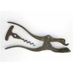 A 19th century English patent two-piece lever and corkscrew, with traces of bronze finish...