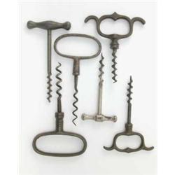 Four 19th century straight-pull four finger corkscrews, with various loops and shanks, traces of...