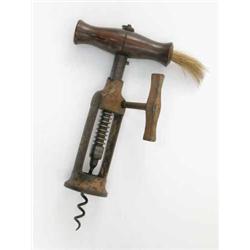 An early 19th century London rack corkscrew, with turned wood handle with brush and side handle,...
