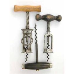 A Continental spring pull monopol split frame corkscrew, a further spring pull screw indistinctly...