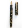 Image 1 : A Parker Duofold fountain pen, black and gold marble celluloid finish with gold 'N' nib and butto...