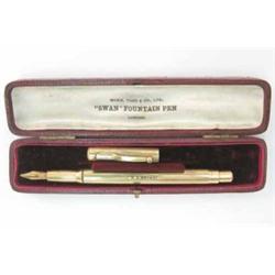 A Mabie Todd & Co. Swan gold plated cartridge pen, engraved pin-stripe barrel with patent stamp 1...