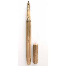 A De la Rue Onoto early 20th century fountain pen, reeded finish with plunger action filler, 5ins...