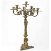Image 1 : A 19th century gilt metal 7-branch candelabrum, each arm cast with scrolled foliage and fruit wit...