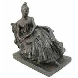Van der Straeten, a bronze of a Lady reclining in a chair, naturalistically modelled with flowing...