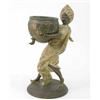 Image 1 : L. Hottot, an Orientalist spelter figure of a boy carrying a pot, naturalistically modelled in ar...